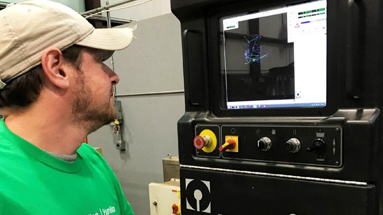 Man looking at computer prototyping screen.